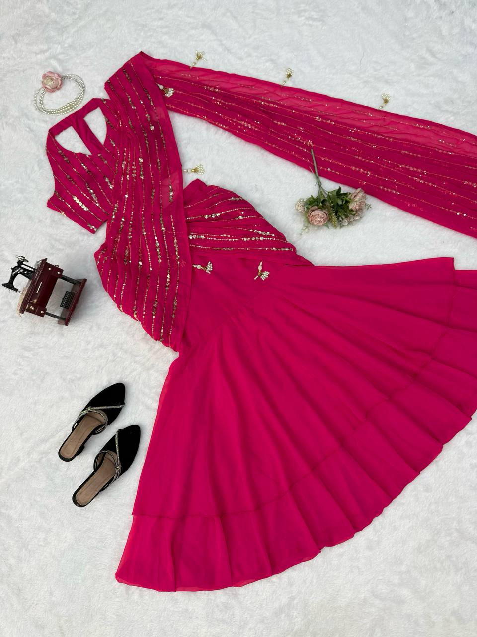 Radiant Rani Pink Silk Lehenga Choli Adorned with Opulent Heritage Floral Motifs and Intricate Zari Borders